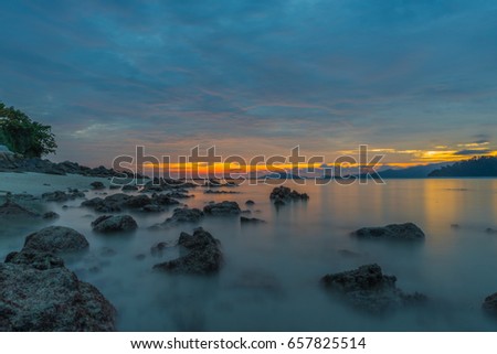Vibrant sunset seascape on the beach of Lipeh Island,Thailand
