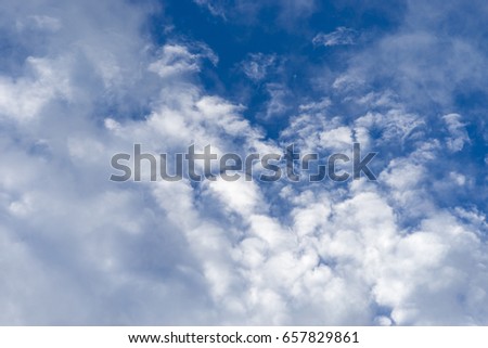 Blue sky with clouds for background.