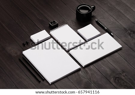 Blank corporate stationery on black stylish wood background. Branding mock up for branding, graphic designers presentations and business portfolios. Royalty-Free Stock Photo #657941116