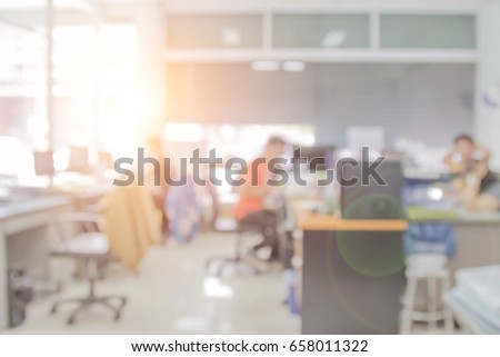 Businessmen blur in the workplace or table top and Office of table work in office with computer or shallow depth of focus of abstract background.
