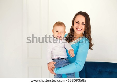 Happy mother and son on a white background