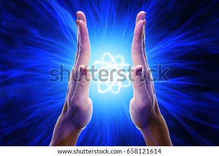 Hands with energy rays Royalty-Free Stock Photo #658121614