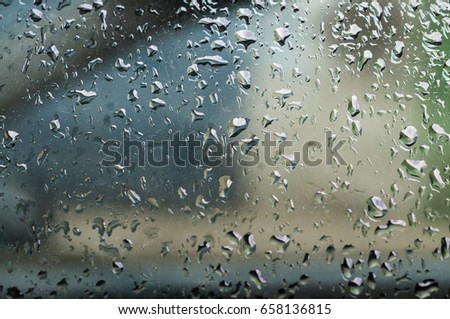 Raindrops on the car glass