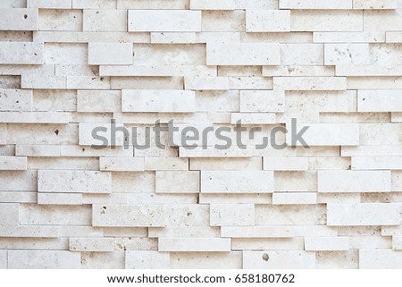 Gray stone wall closeup background photo texture.