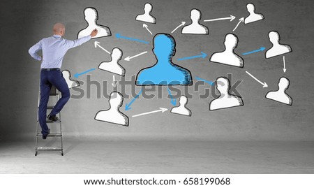 Businessman in modern interior drawing social network sketch on a wall 3D rendering
