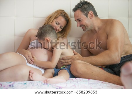 Family of three and the pregnant woman
