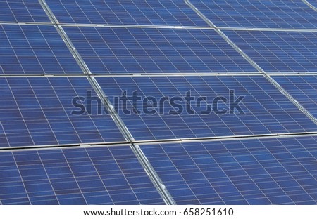 Detailed photo to photovoltaic solar panels in metal frame