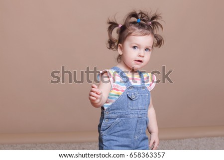 funny girl with pigtails in summer 1