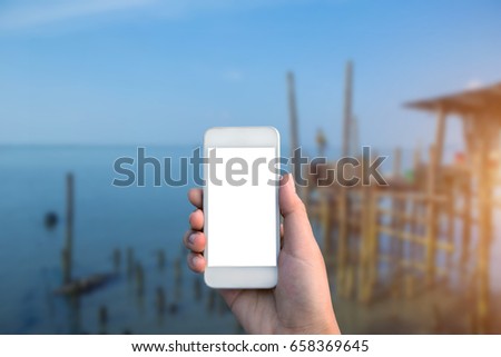 Women hand using smart phone
