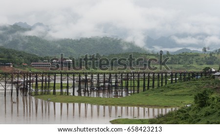 Unseen thailand Sangkhlaburi wooden friendship bridge Thailand in rainy season  at Sangkhlaburi, Kanchanaburi Thailand