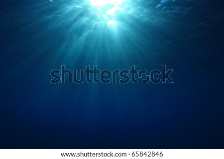 Abstract Underwater Background of Sunburst on Ocean Surface