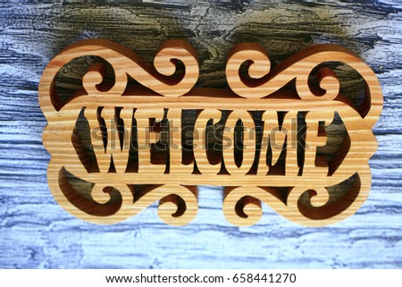 wooden welcome sign 