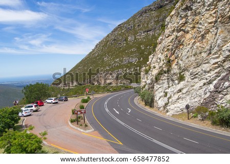Vantage point near George in South-Africa to view beautiful landscapes with road in a mountain range