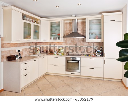 Interior of  beige kitchen in modern house