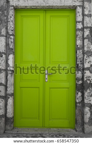 Green door in an old building