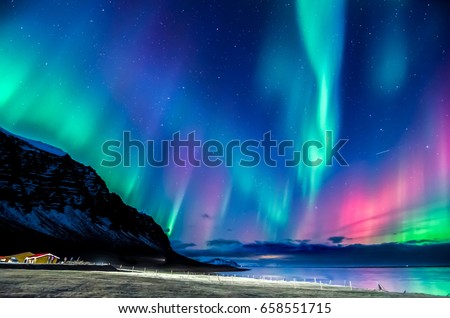 colorful northern light in iceland Royalty-Free Stock Photo #658551715