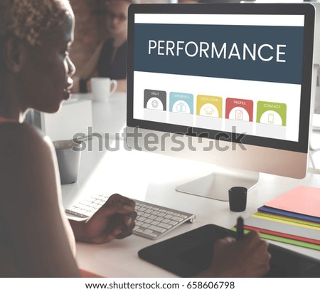 African woman working using computer screen and mousepad