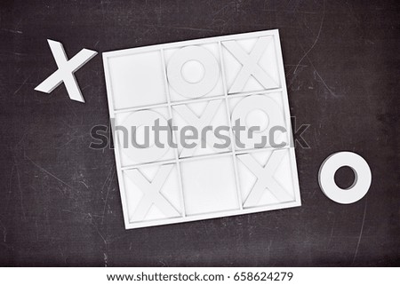 A studio photo of naughts and crosses
