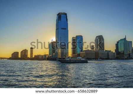 Cruise around Manhattan at sunset - Architectural modern buildings at lower Manhattan - Skyline view at New York City