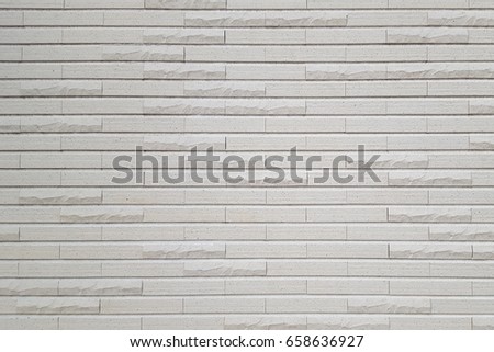 White brick wall texture as abstract wallpaper background.