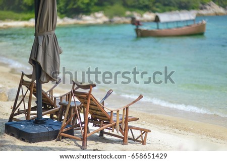 White cradle tied to the beach beach tree