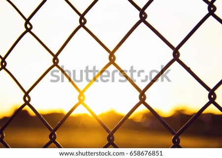 Fence and a sunrise