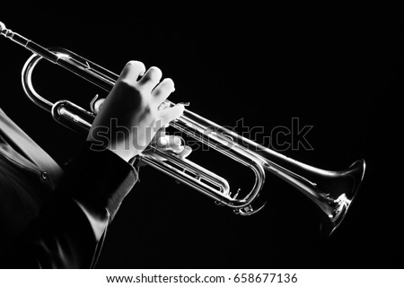 Trumpet player. Trumpeter playing music jazz instrument. Brass orchestra instrument.