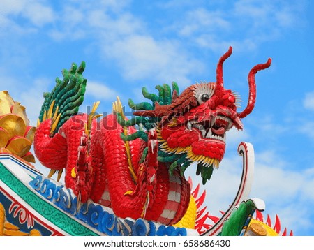Colorful dragon statue background is sky.
