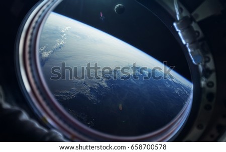 Science fiction space wallpaper, blue earth from space station window. Elements of this image furnished by NASA