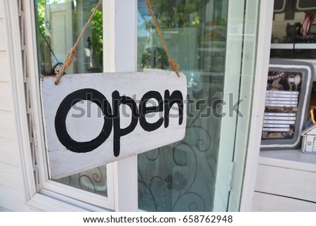 open sign on window coffee shop