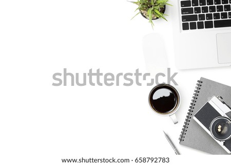 White photographer desk with laptop and office supplies. Top view, flat lay.