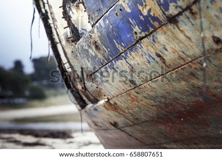 Detail of an old abandoned boat in France