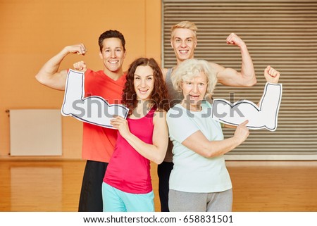 Friends and senior showing their muscles at fitness center