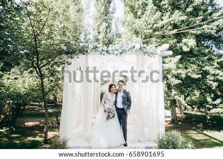 Wedding couple have a photo session in the amazing studio at the nature