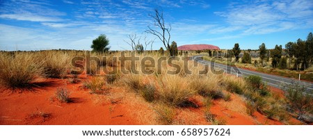 Australia Landscape : Road to Red rock of Alice Spring Royalty-Free Stock Photo #658957624