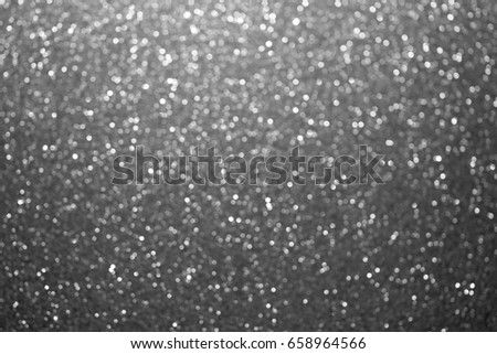 Festive decorative abstract background with sparkling shimmering glitter. Beautiful bokeh background for your design. Luminosity template for creating of backgrounds of different colors