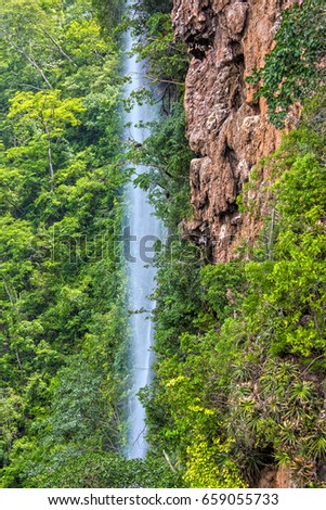 Beautiful waterfall in the rainforest. Brazil. Latin America