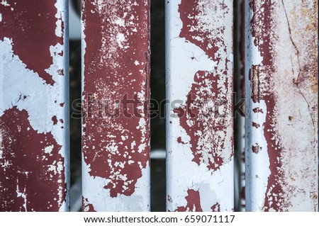  Empty red metal stadium seats. Abstract rust texture of metal seats .