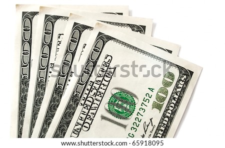 many banknotes of hundreds dollars on white background