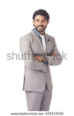Crossed hands young businessman confident and successful on white.