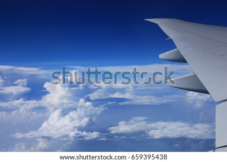 cloud in white color and kinds of shape on the sky during the air plane for background.