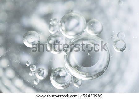 oil bubbles abstract background Royalty-Free Stock Photo #659439985