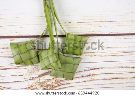 Making of Ketupat, a natural rice casing made from young coconut leaves for cooking rice
