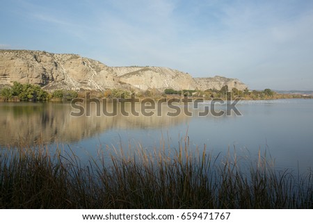 Picture of a lake with reflection of the sky and trees