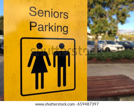 Senior Parking sign in a public parking lot. Elderly people lifestyle concept. No people. Copy space 