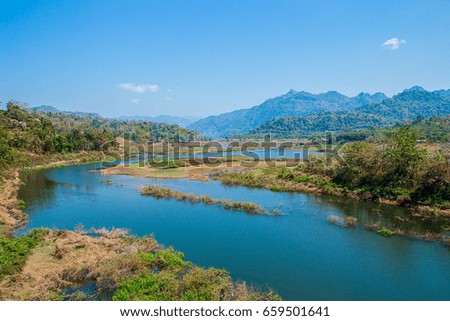 Landscape of river with blue sky, Thailand