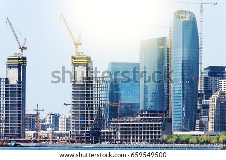 Scenic landscape of skyline Baku with  numerous modern high-rise buildings under construction.Baku is the capital and largest city of Azerbaijan, as well as the largest city on the Caspian Sea.