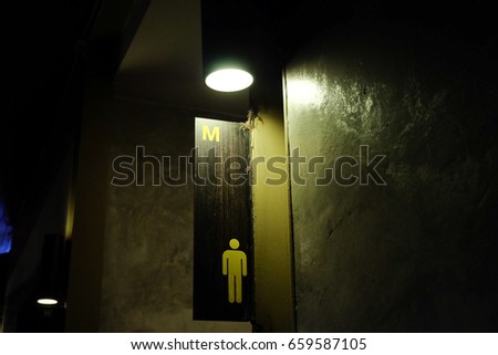 Male bathroom sign.