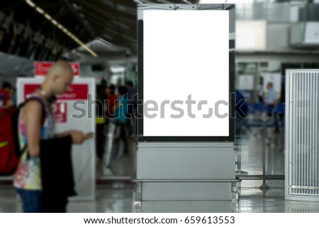 Blank mock up of vertical street poster billboard on Airport Background with plane passengers.