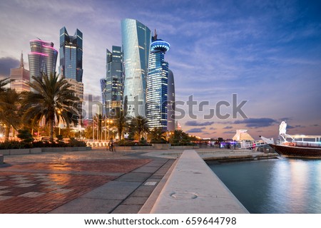 Doha City Center and Corniche street at sunset, Qatar Royalty-Free Stock Photo #659644798